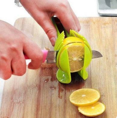 Effortless Slicing with Fruit & Veggie Cutting Holder Tool - Killer Products